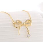 By Queen Γυναικείο Κολιέ Διπλός Φιόγκος S925 Gold Plated Με Ζιργκόν