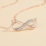 By Queen Κολιέ με το Σύμβολο του Άπειρου Pink Gold με Zircon